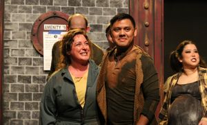 Bobby Strong (Kevin Corpuz, center) leads the Rebellion, in New Line Theatre's URINET Photo