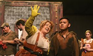 Miss Pennywise (Sarah Gene Dowling) and Bobby Strong (Kevin Corpuz) in New Line Theat Photo