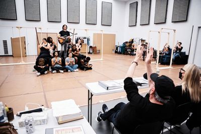 Neil Diamond (foreground) and the cast  Photo