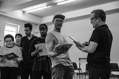 John Partridge and the cast Photo