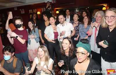 Guests cheering Julie White on  Photo