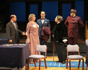 Michael Antico as Hercule Poirot, Catherine Gaffney as Helen Hubbard, Nicholas Wilder, Cara D’Emanuele and Brennan Lowery @ BroadwayWorld Michael Antico as Hercule Poirot, Catherine Gaffney as Helen Hubbard, Nicholas Wilder Photo