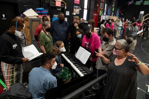 Andrea Grody, Laurie Woolery, and the company  Photo