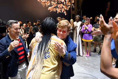 Elton John and the cast of The Devil Wears Prada Photo