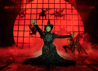 Talia Suskauer as Elphaba in WICKED Photo