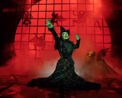 Talia Suskauer as Elphaba in WICKED Photo