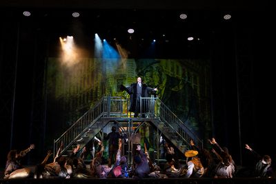 Berto Fernández (center) as J.P. Morgan Photo