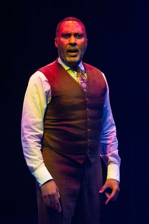  Ken Robinson as Mister Photo