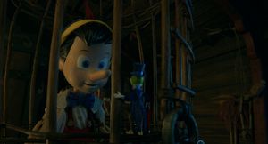Pinocchio (voiced by Benjamin Evan Ainsworth) and Jiminy Cricket (voiced by Joseph Gordon-Levitt) in Disney's live-action PINOCCHIO @ BroadwayWorld Pinocchio (voiced by Benjamin Evan Ainsworth) and Jiminy Cricket (voiced by Joseph Go Photo