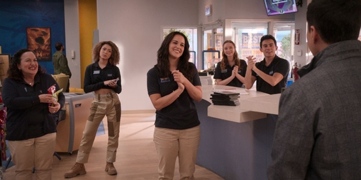 Olga Merediz as Connie, Kamaia Fairburn as Kayla, Melissa Fumero as Eliza, Madeleine Arthur as Hannah, Tyler Alvarez as Carlos, Randall Park as Timmy in episode 104 of Blockbuster at 