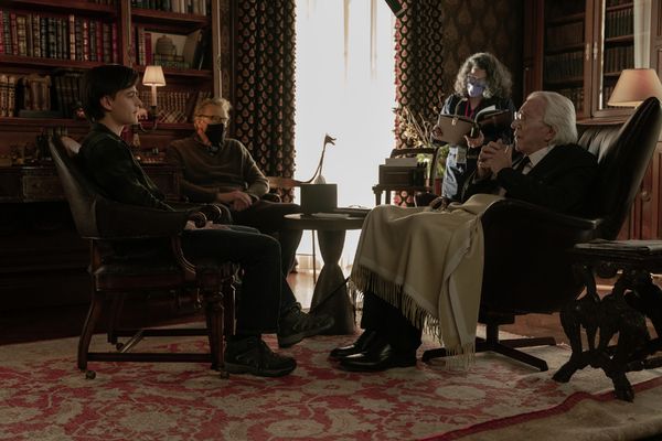 Jaeden Martell as Craig, director John Lee Hancock and Donald Sutherland as Mr. Harri Photo