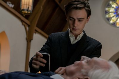 Jaeden Martell as Craig and Donald Sutherland as Mr. Harrigan in Mr. Harrigan’s Pho Photo