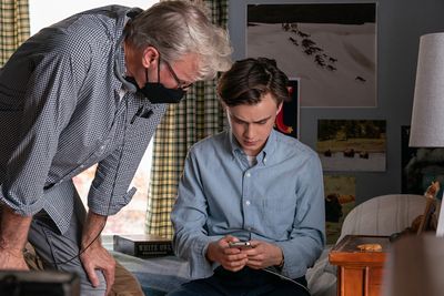 Director John Lee Hancock and Jaeden Martell as Craig on the set of Mr. Harrigan’s  Photo