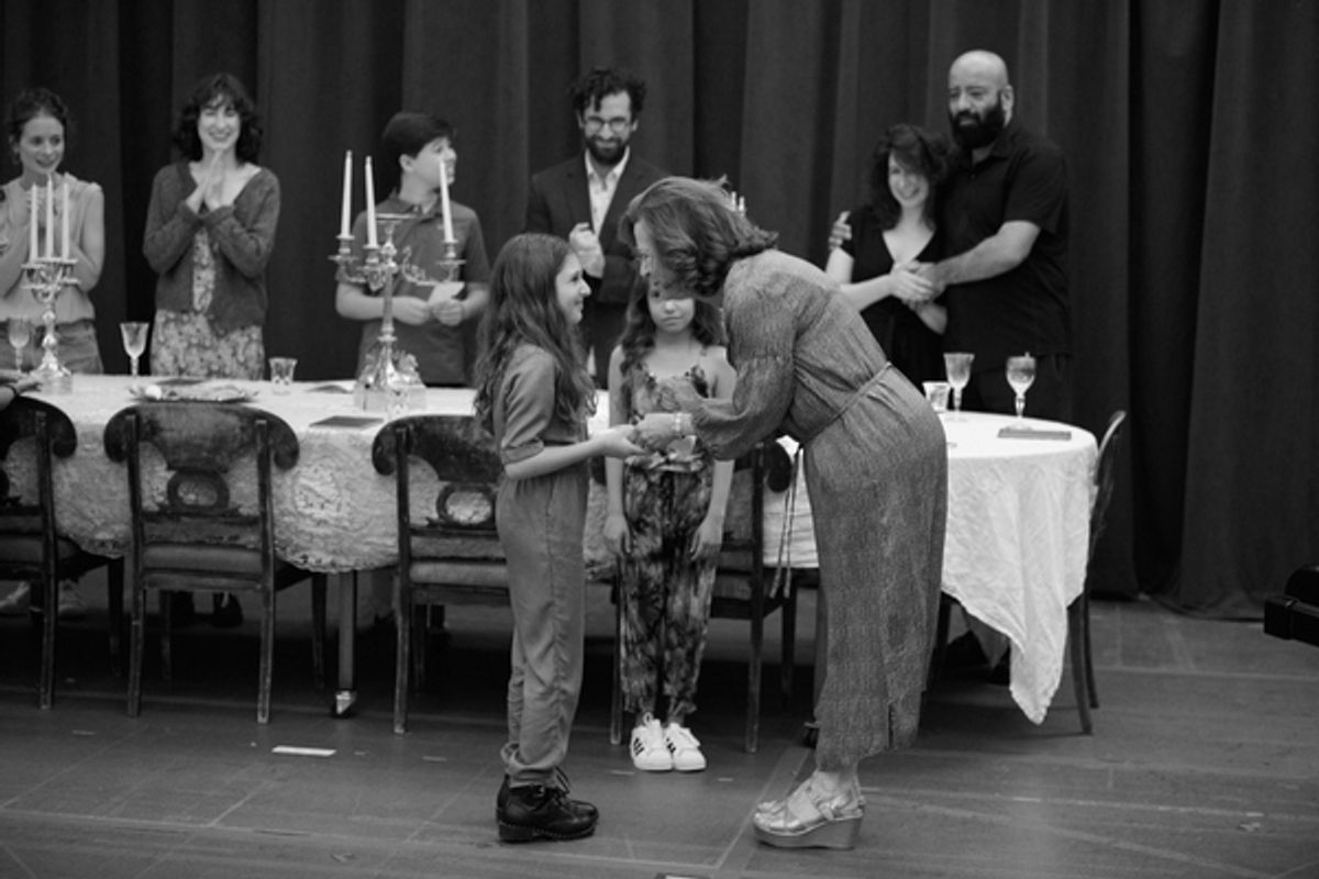 from left to right, behind table: Faye Castelow, Colleen Litchfield, Drew Squire, Brandon Uranowitz, Jenna Augen, Aaron Neil; in front of table: Ava Michele Hyl, Reese Bogin, Betsy Aidem at 