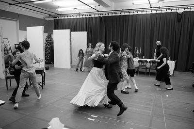 from left to right, foreground: Joshua Satine and Faye Castelow; Caissie Levy and Bra Photo