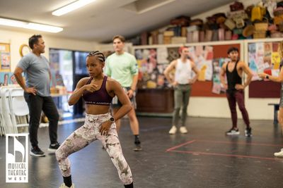 Aurelia Michael-Holmgren (Gloria Thorpe) and ballplayers   Photo