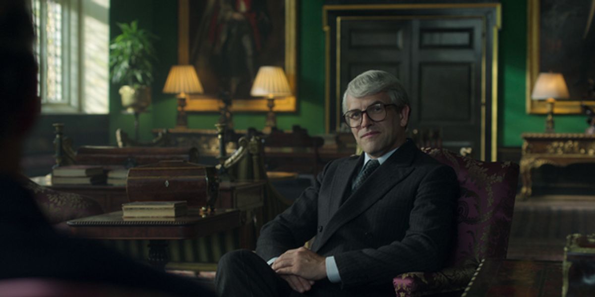 Jonny Lee Miller as Prime Minister John Major at 