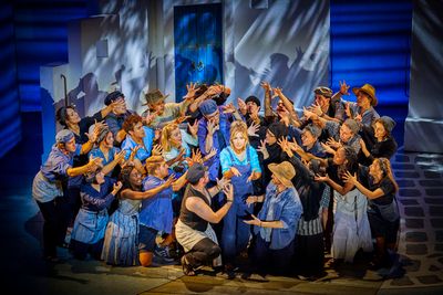 Centre, Mazz Murray with the cast Photo