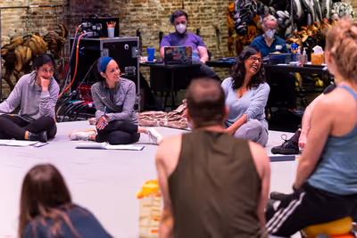 Lolita Chakrabarti (center) and members of the company Photo