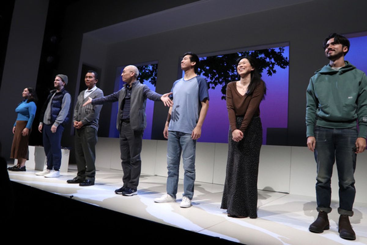 The company at curtain call at 