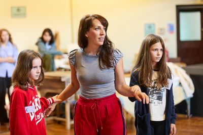 Lizzie Winkler and the young company cast Photo