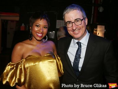 Alicia Quarles and Host John Oliver Photo