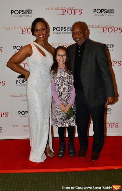 Nikki Renee Daniels and her daughter Lena and her father Photo