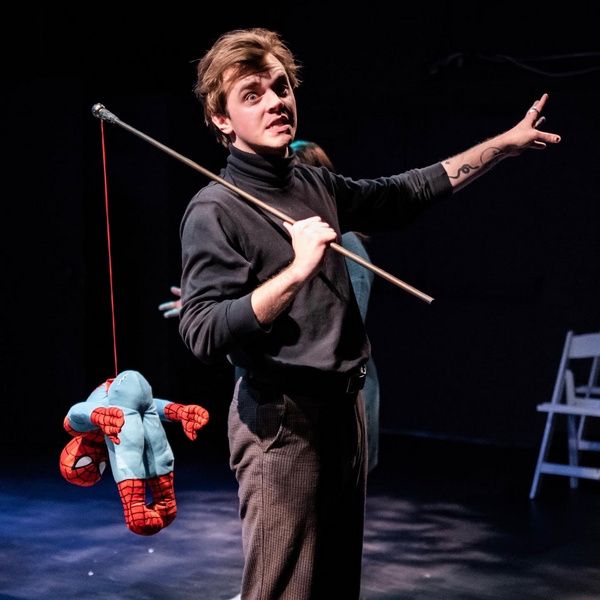 Alex B. Burnette as Michael Riedel & the cast of THE SPIDER QUEEN; photo by Ashleigh  Photo