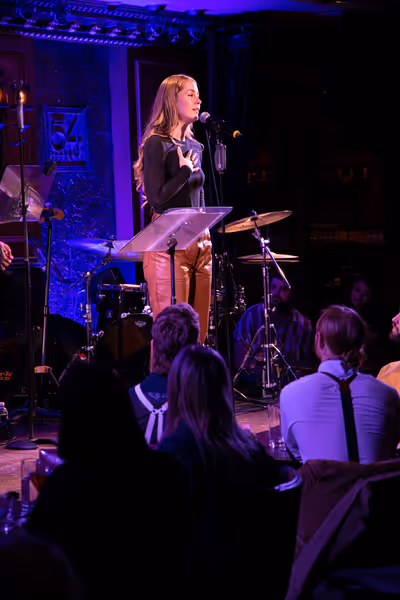 Mary Kate Moore sings Bright Lights and Cityscapes by Sara Bareilles at 54 Sings For  Photo