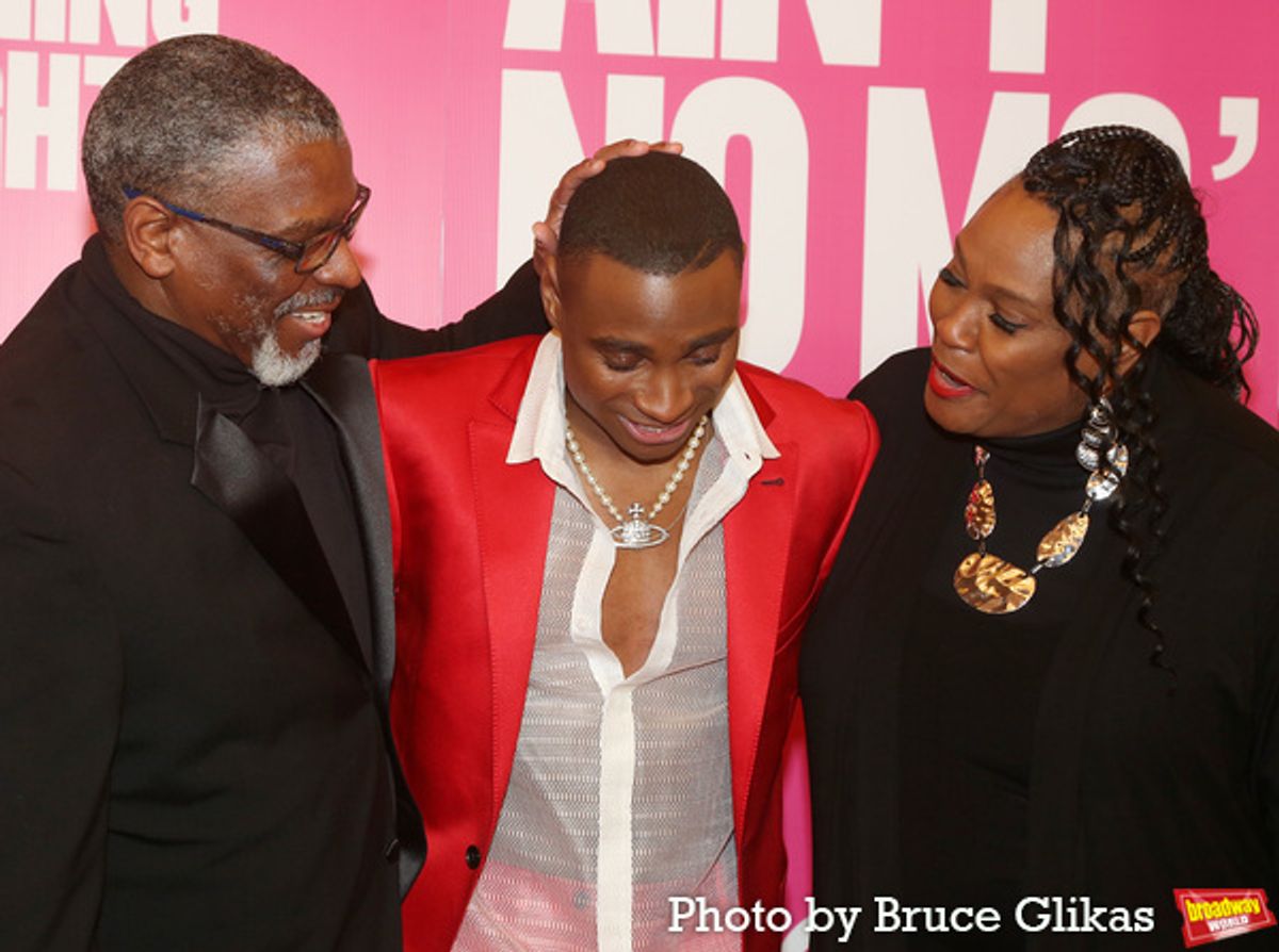Jordan E. Cooper and his parents at 