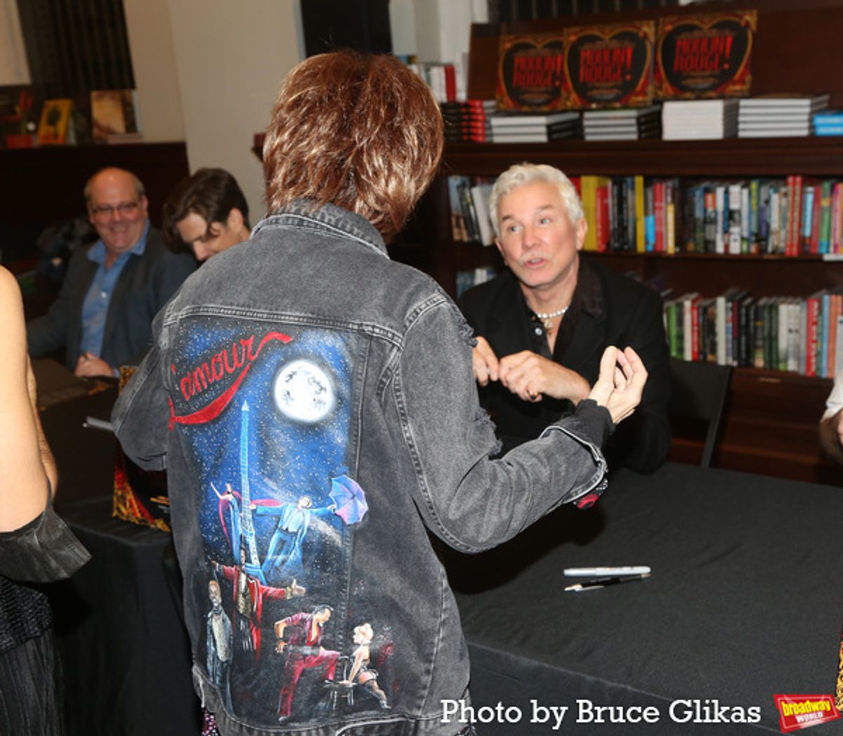 Baz Luhrmann and a fan at 