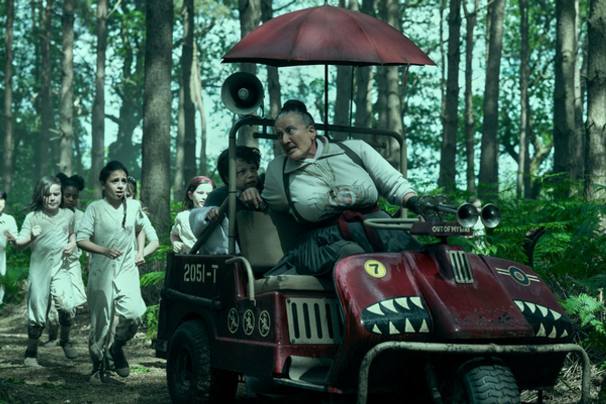 Charlie Hodson-Prior as Bruce Bogtrotter, Emma Thompson as Agatha Trunchbull at 