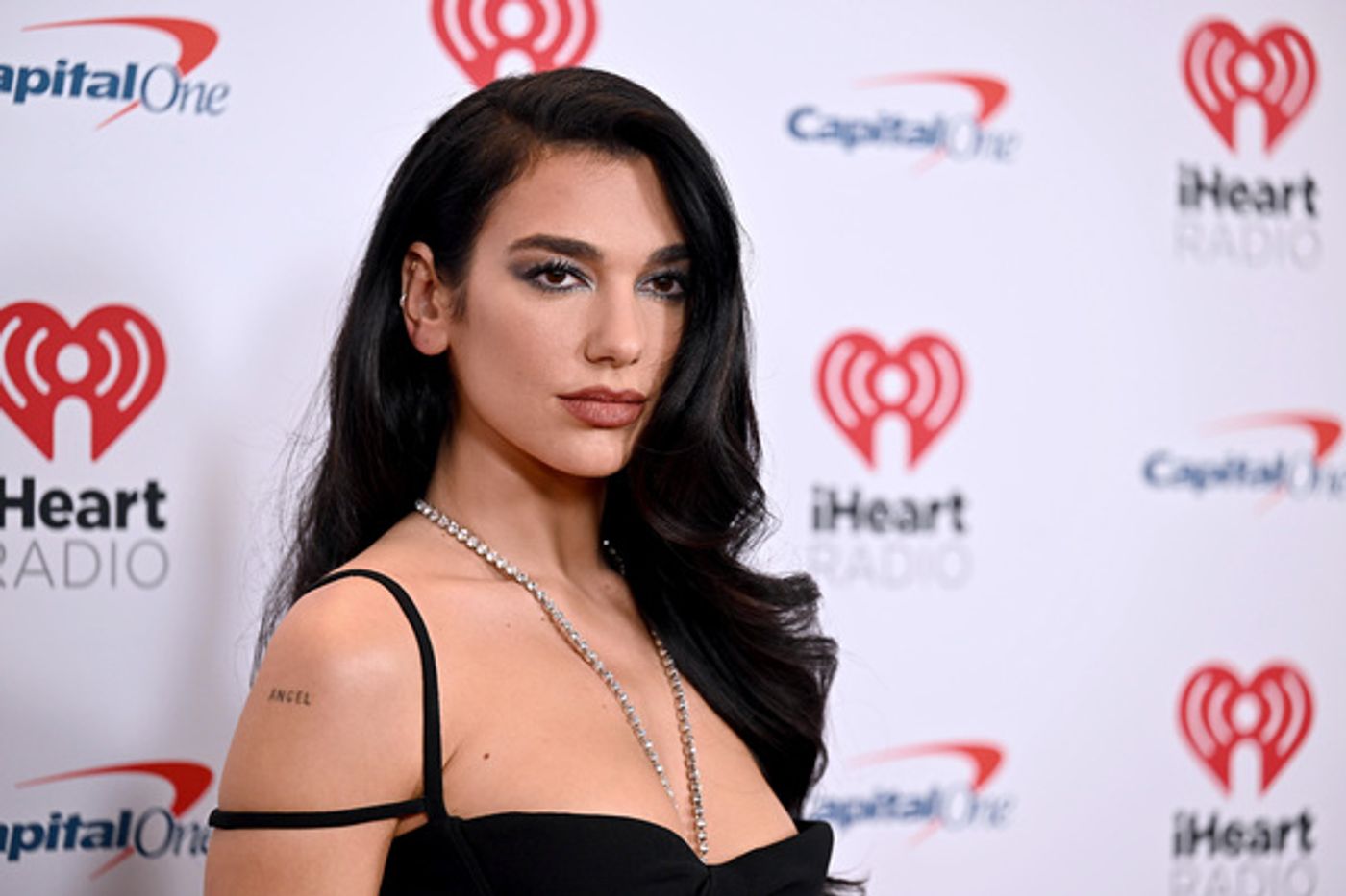 Photos: Dove Cameron, Dua Lipa & More Attend iHeart Radio's Jingle Ball  Image