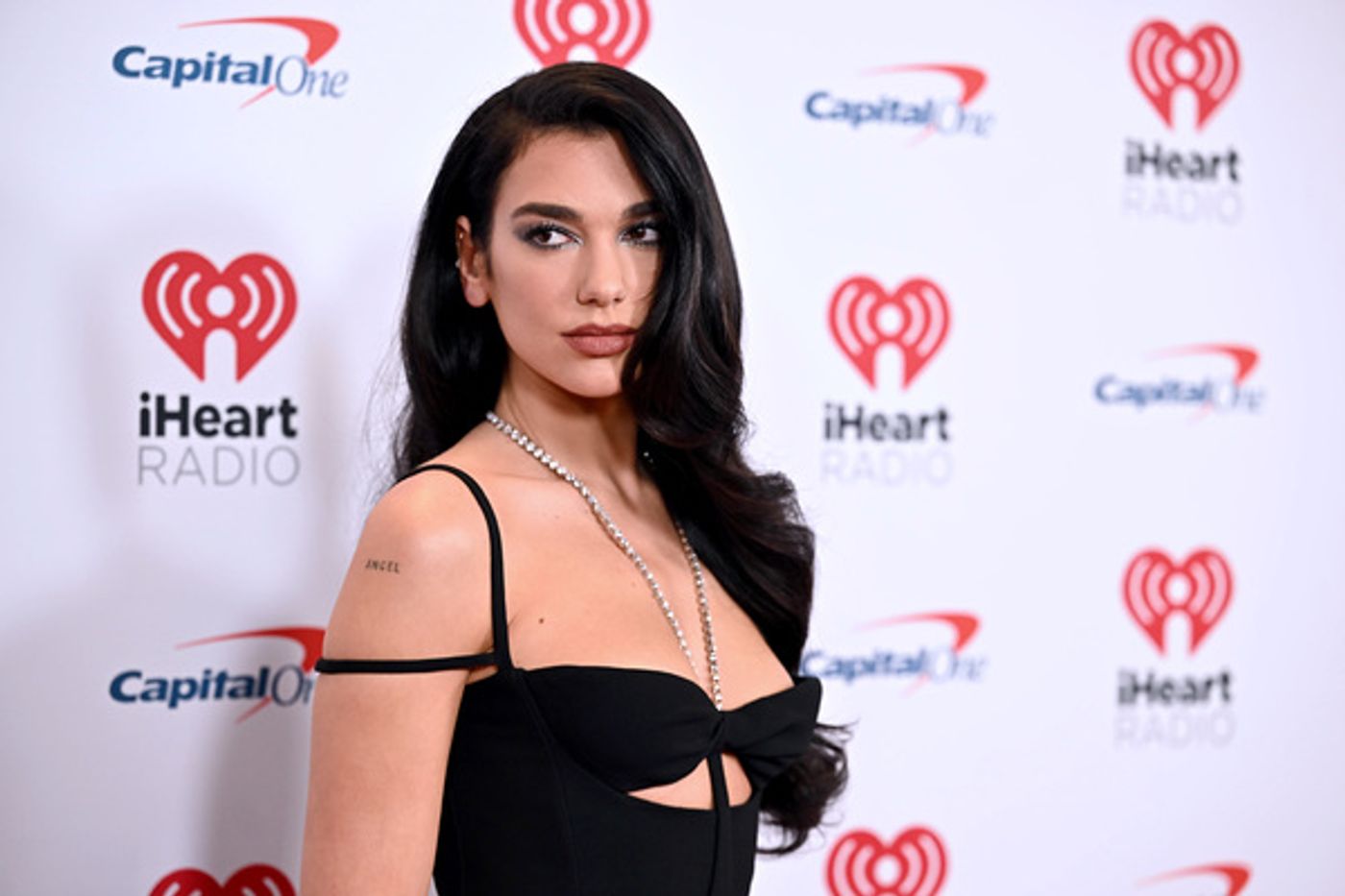 Photos: Dove Cameron, Dua Lipa & More Attend iHeart Radio's Jingle Ball  Image