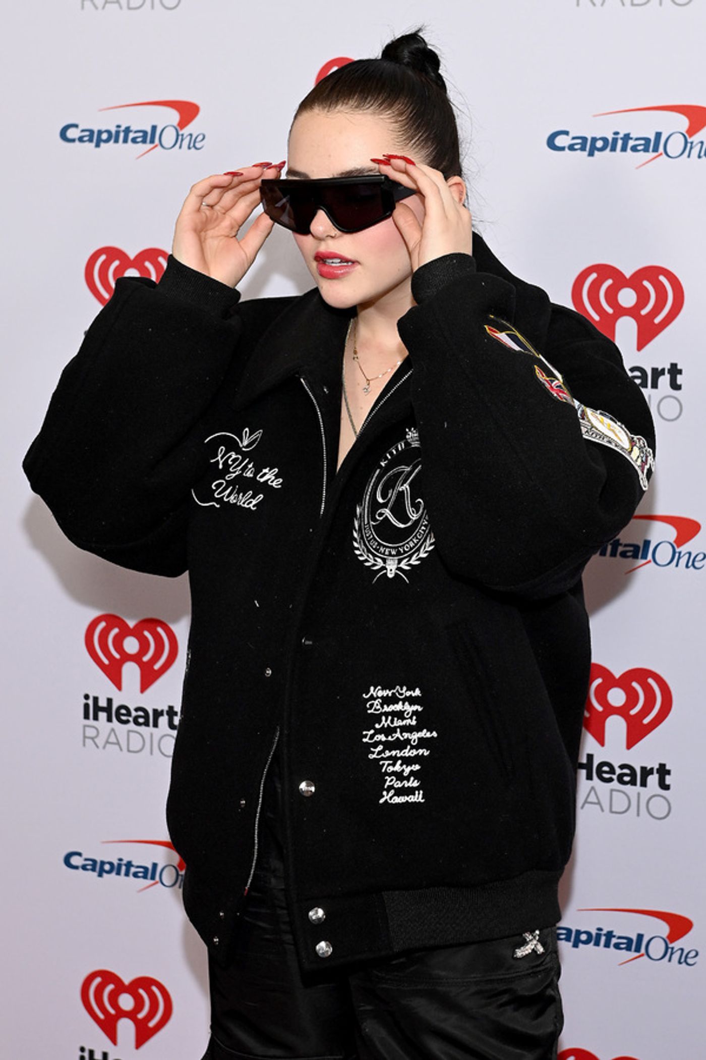 Photos: Dove Cameron, Dua Lipa & More Attend iHeart Radio's Jingle Ball  Image