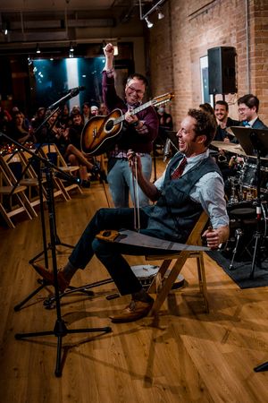 The final note of the Lincoln Squares reunion performance of Let it Snow, featuring Michael Mahler on Guitar and Alex Goodrich on Banjo, Harmonica, and Saw. (Photo by Elizabeth Stenholt) @ BroadwayWorld The final note of the Lincoln Squares reunion performance of Let it Snow, featuring M Photo