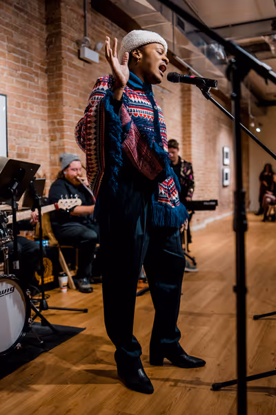 Juwon Tyrel Perry with his rendition of Santa Baby. (Photo by Elizabeth Stenholt) Photo