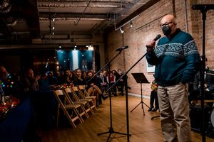 Season of Concern Board President Luther Goins speaks on behalf of The Beautiful City Photo