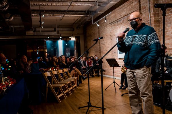 Season of Concern Board President Luther Goins speaks on behalf of The Beautiful City Photo