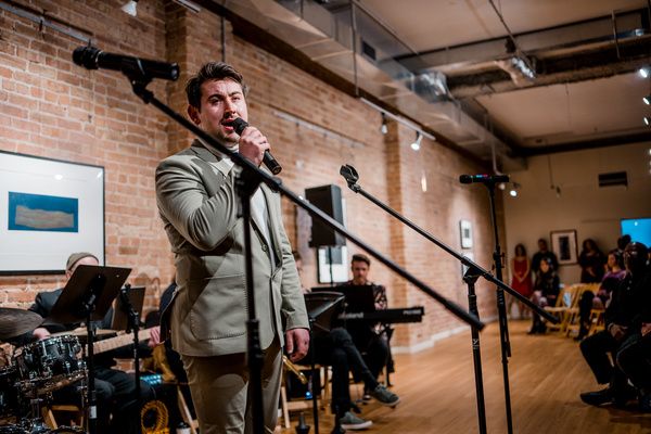 Luke Nowakowski sings What Are You Doing New Years Eve?. (Photo by Elizabeth Stenholt Photo