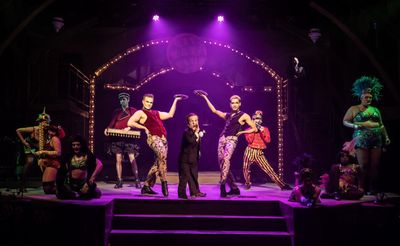 Josh Walker and the cast of  CABARET  Photo