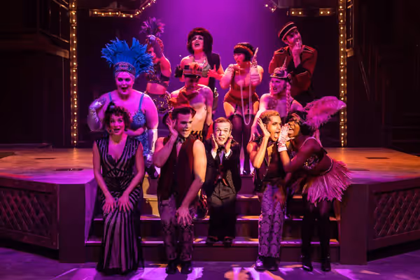 Josh Walker and the cast of  CABARET  Photo