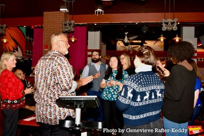 Gabriel Stelian-Shanks toasting the office staff Photo