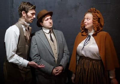 Holmes and Watson question a local resident. from left: Aaron Frank, Zachary Macias,  Photo