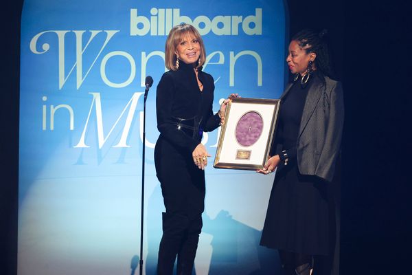 Sylvia Rhone accepts the Executive of the Year Award from Fatima Robinson onstage Photo
