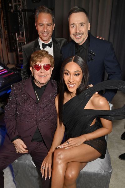 Elton John, Eric McCormack, Michaela Jaé Rodriguez and David Furnish Photo
