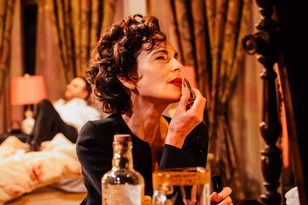 Aaron Costa Ganis (background) and Elizabeth McGovern  Photo