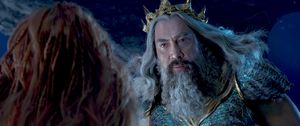 Halle Bailey as Ariel and Javier Bardem as King Triton Photo