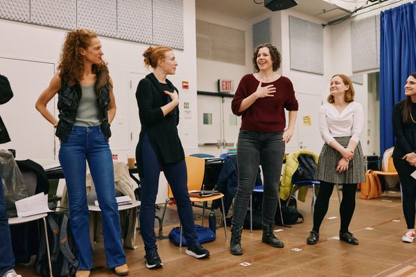 Valeria Solmonoff, Kelsey Burns, and Claire Warden in rehearsal for Evita, at America Photo