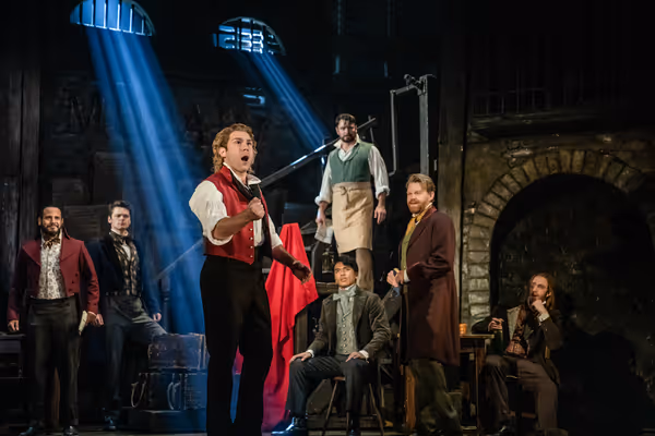 Devin Archer & company in Les Misérables. Photo by Matthew Murphy & Evan Zimmerman f Photo